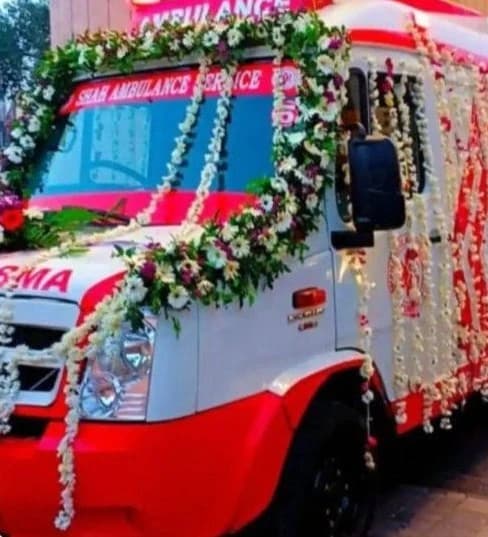 Decorated freezer van used for a dignified funeral procession